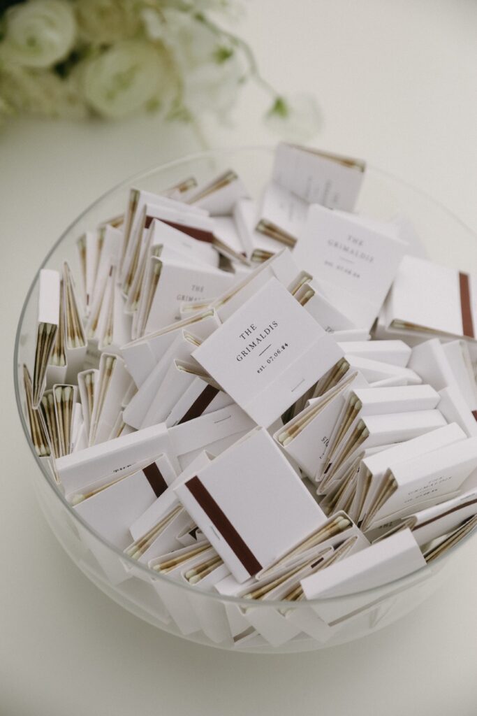 Stylish black and white custom matchbook wedding favors an elegant estate wedding.